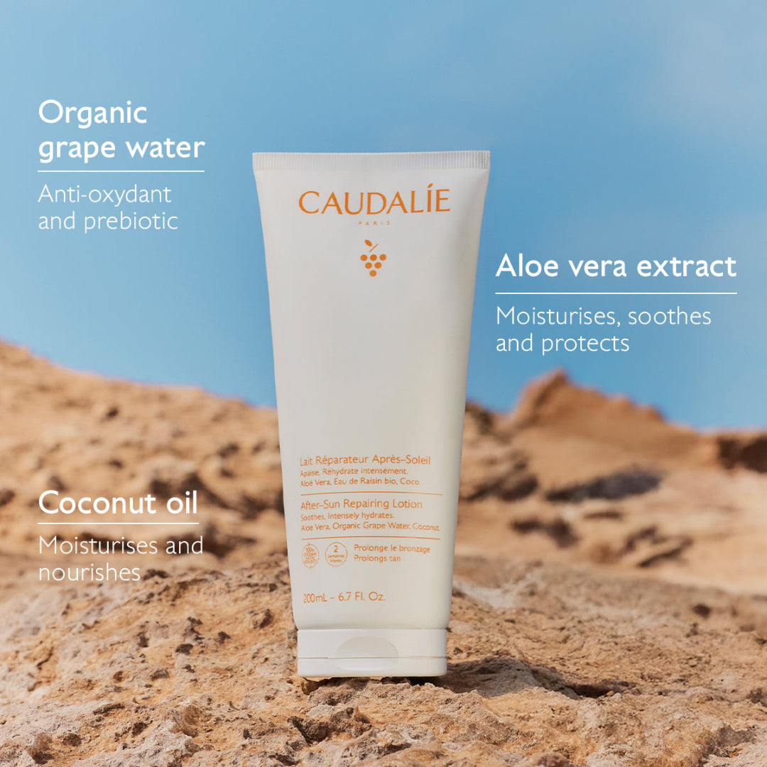 Caudélé skincare product on a rocky surface with a blue sky background