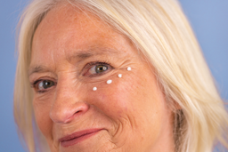 a closeup of a womens face with Proto-col Collagen Eye Filler applied