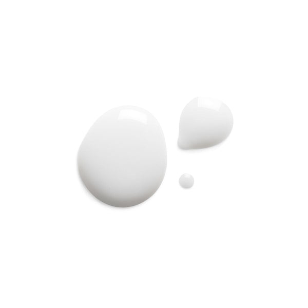 Three white droplets on a light beige background