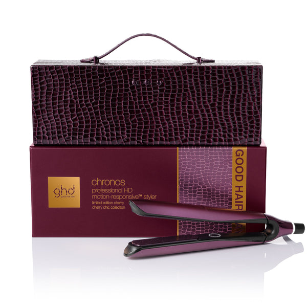 ghd hair straightener with packaging on a white background