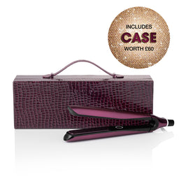 Purple hair straightener with textured case on a white background