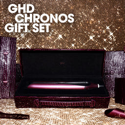 GHD Chronos hair styling tool in a gift set with a decorative background