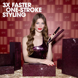 Woman holding a ghd hair straightener with text '3X FASTER ONE-STROKE STYLING' on a patterned background.