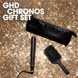 GHD Chronos gift set with hair dryer, straightener, and brush on a glittery background