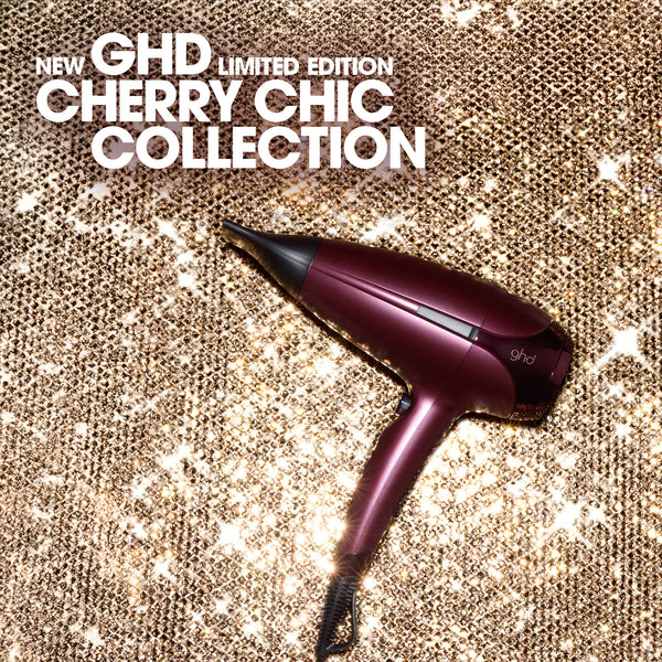 GHD hair dryer with 'New GHD Limited Edition Cherry Chic Collection' text on a glittery background