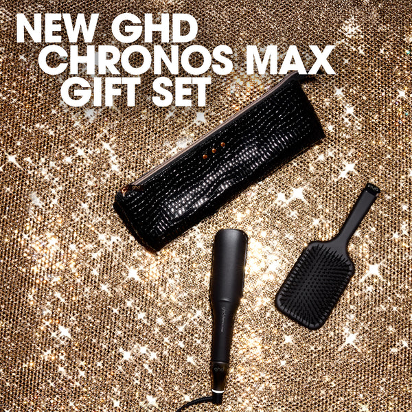 New GHD Chronos Max gift set with hair styling tools on a textured gold background