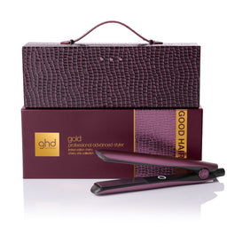 ghd gold professional advanced styler with limited edition cherry design in branded box on a white background
