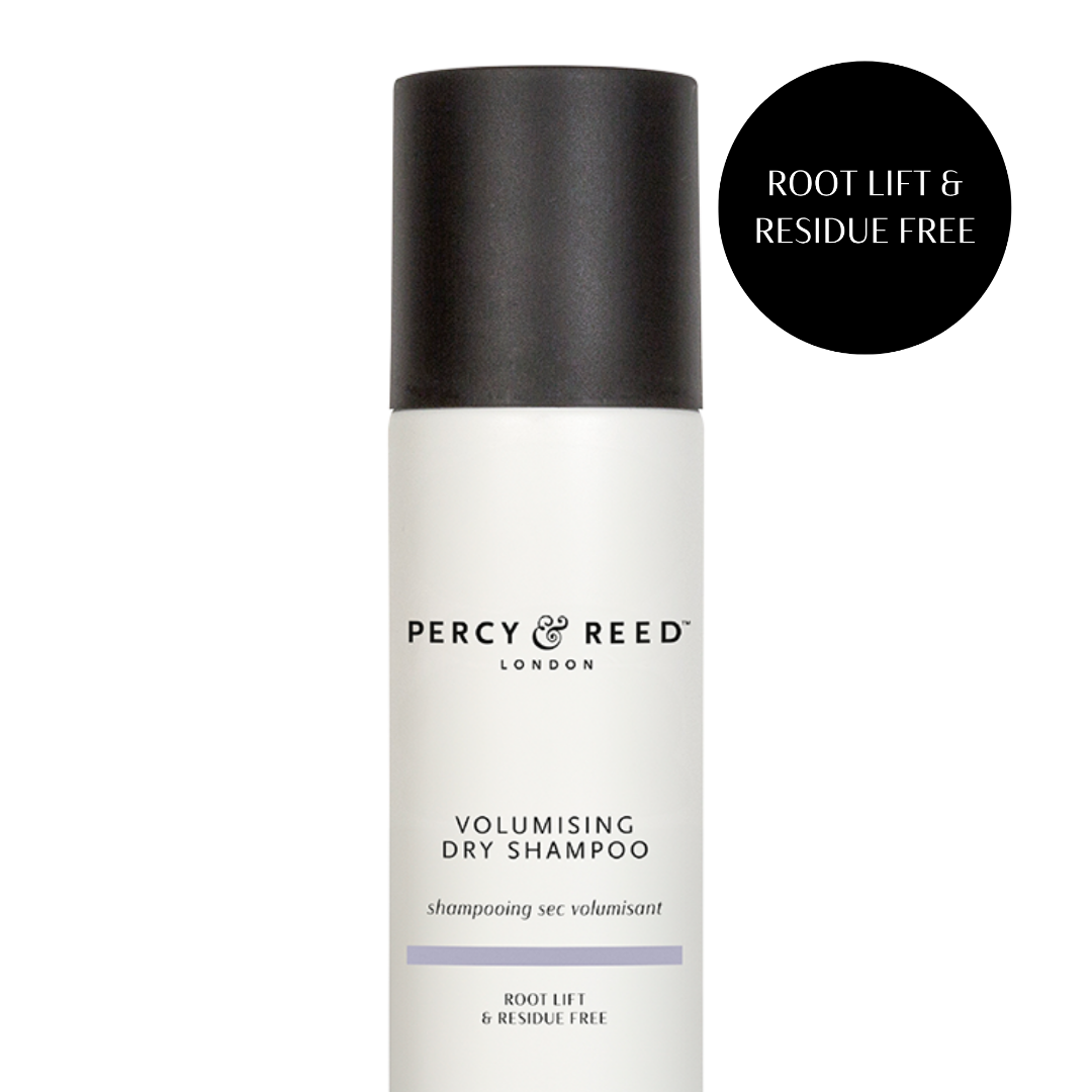 Percy & Reed London Volumising Dry Shampoo bottle with a black cap and white body, shown on a white background with a black circular badge reading 'ROOT LIFT & RESIDUE FREE'.