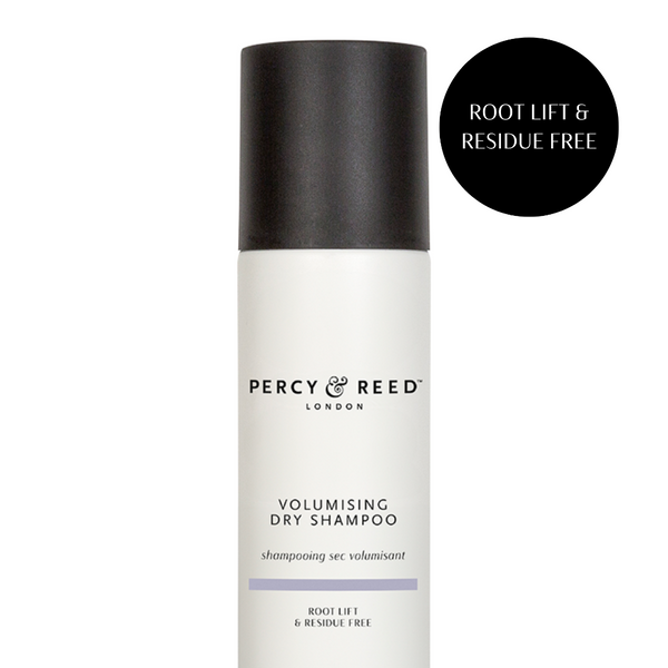 Percy & Reed London Volumising Dry Shampoo bottle with a black cap and white body, shown on a white background with a black circular badge reading 'ROOT LIFT & RESIDUE FREE'.
