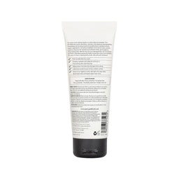 Back view of a skincare product tube with text on a white background