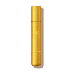 Gold cosmetic bottle with 'AB' branding on a white background