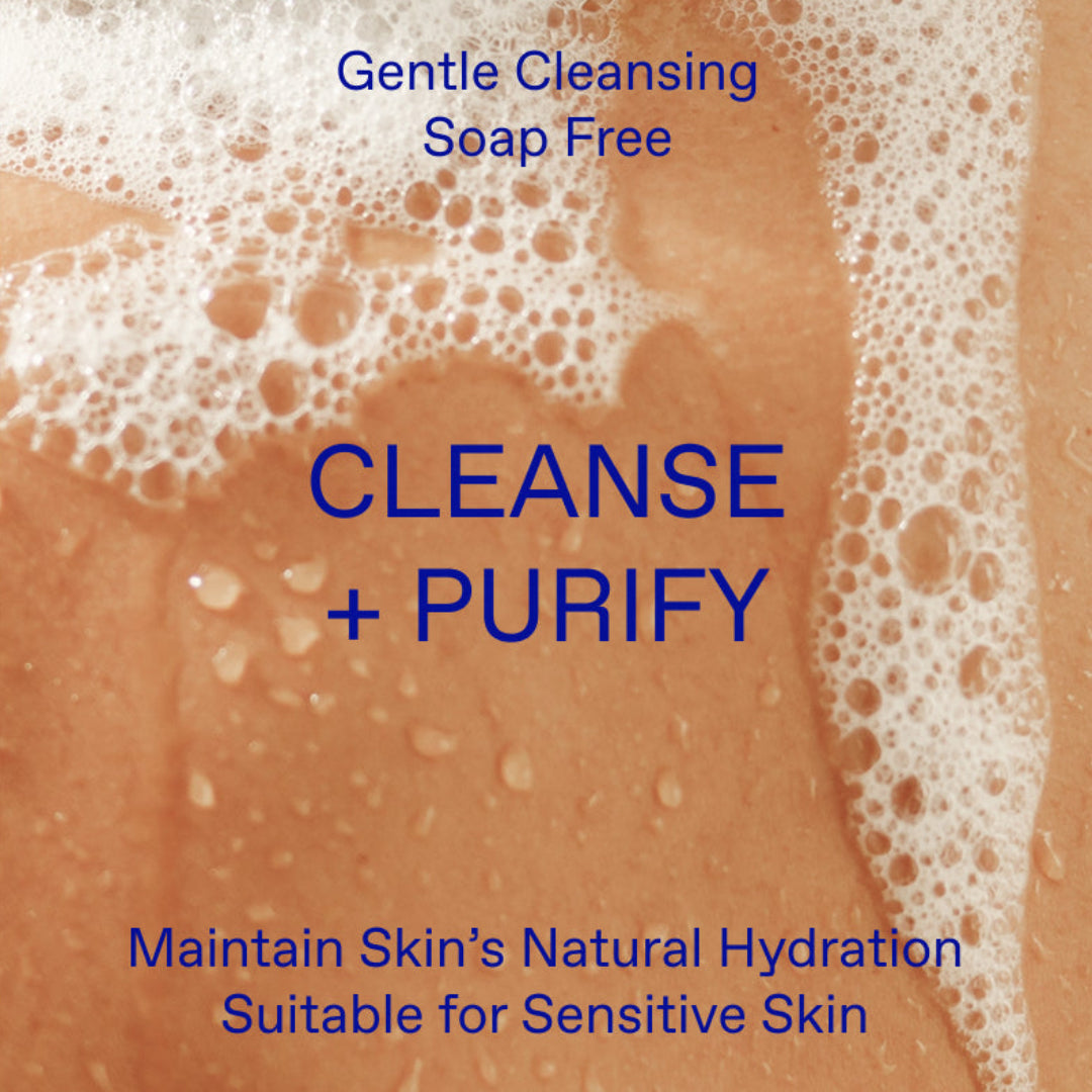 Soap-free cleansing product with foam and text on a brown background
