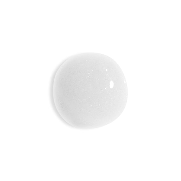 A single glossy white oval droplet or bead centered on a plain white background.
