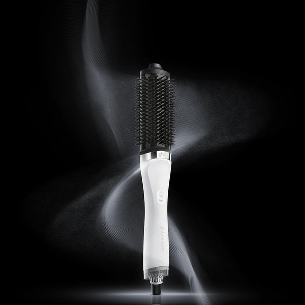 Hair styling tool with a black and white design on a dark background