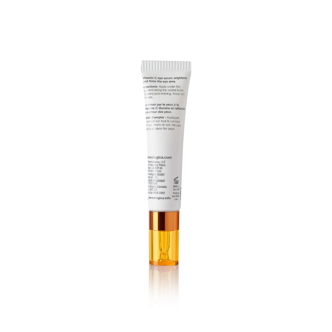 Skincare tube with white label and gold cap on a white background