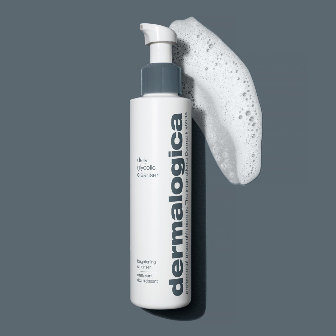 Dermalogica daily glycolic cleanser with a pump on a gray background