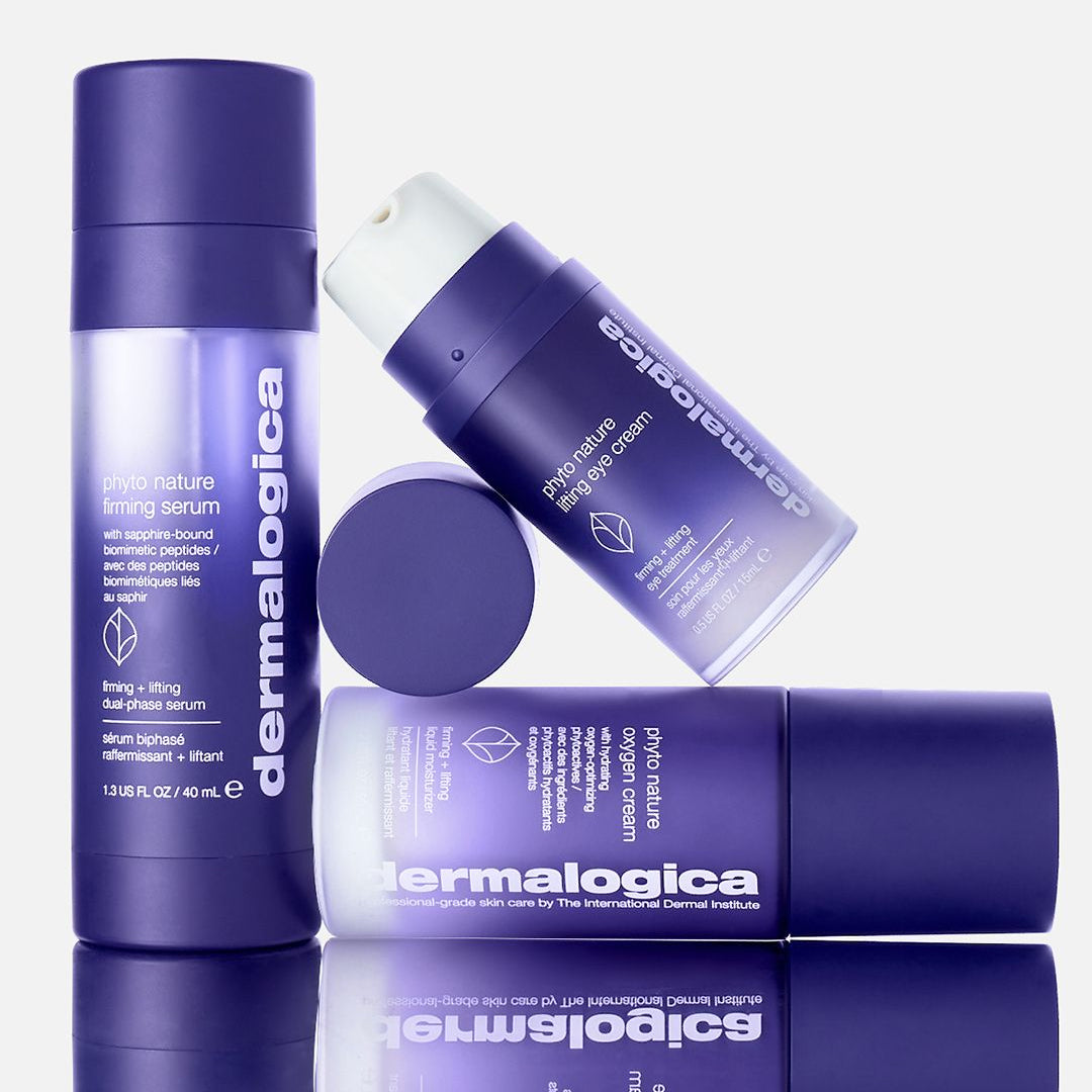Dermalogica skincare products including a serum, eye cream, and stick on a light gray background