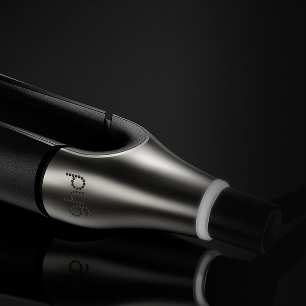 Black and silver electronic device with 'pyrol' branding on a black background