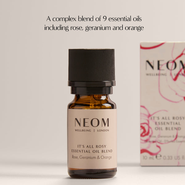NEOM essential oil bottle with packaging on a light background