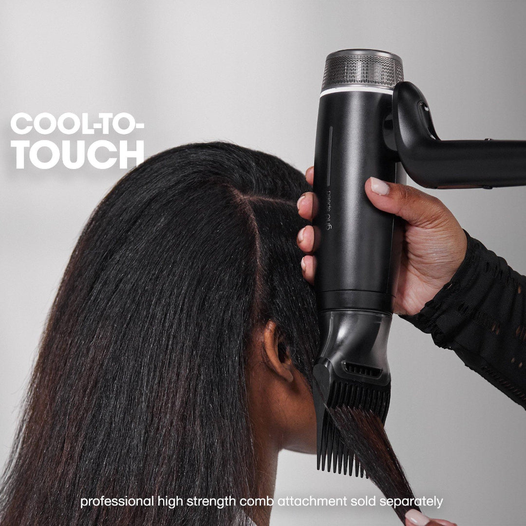 Person using a hair dryer on another person's hair with 'Cool to Touch' text.