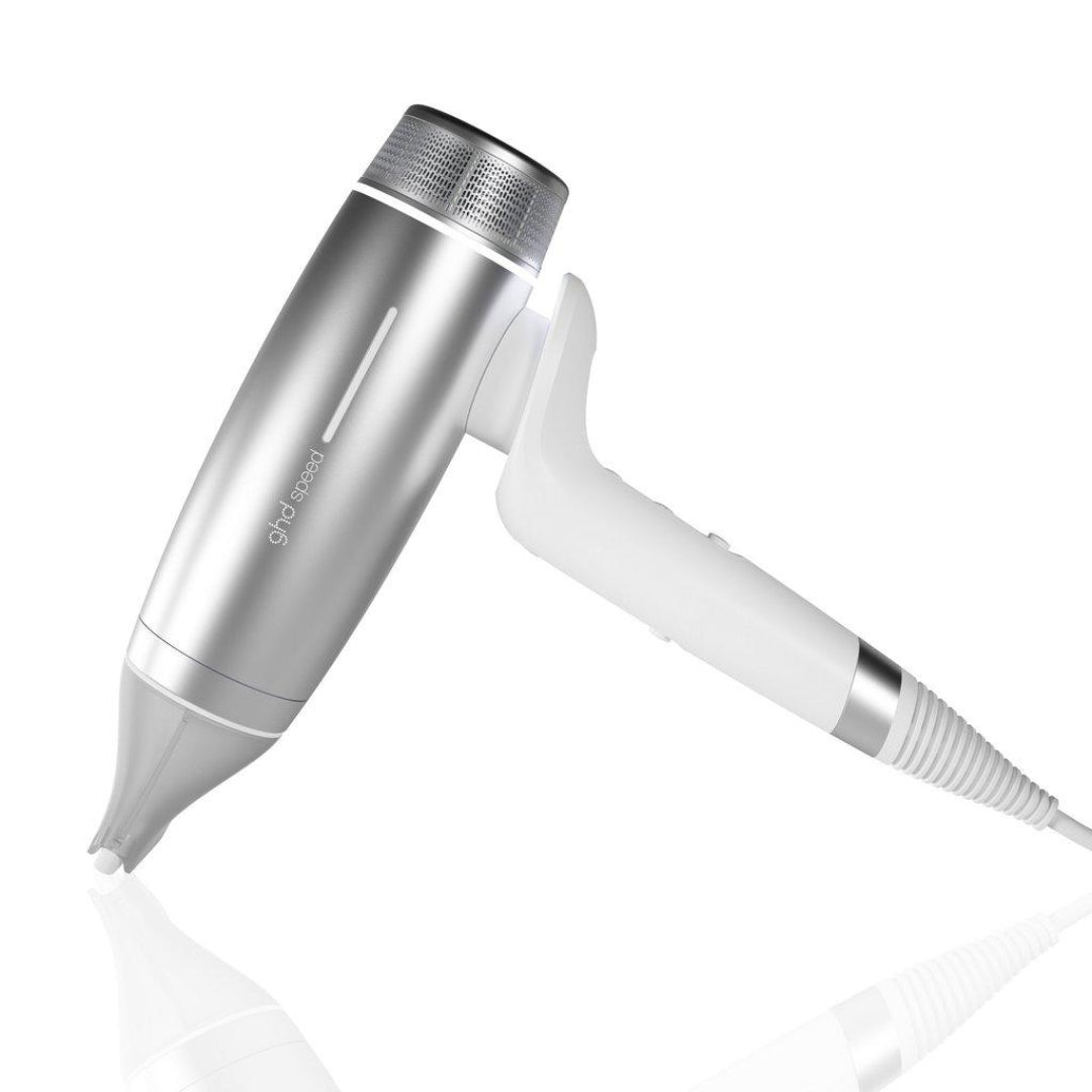 Silver and white hair dryer on a white background