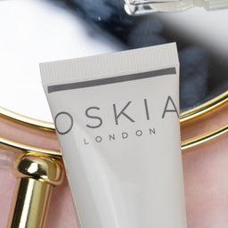 Oskia London skincare product with a blurred background