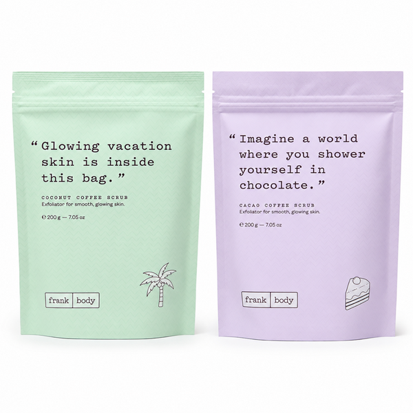 Two stand-up pouches of Frank Body exfoliating scrubs side by side on a white background. The left pouch is a light mint green for Coconut Coffee Scrub, and the right pouch is a light lavender purple for Cacao Coffee Rinds.