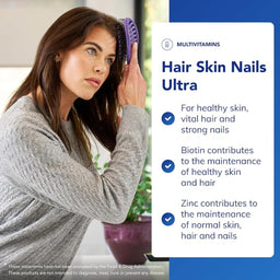 Woman with long hair holding a purple hairbrush, with an advertisement for 'Hair Skin Nails Ultra' multivitamins on the right.