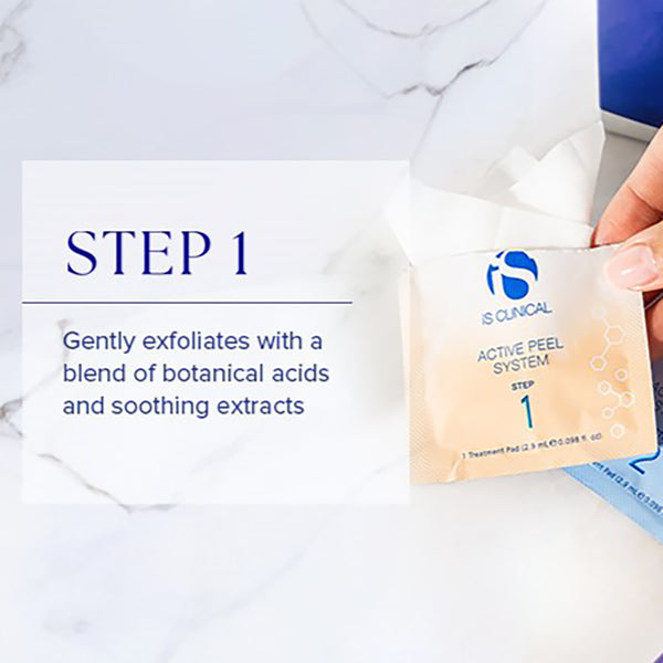 IS Clinical Active Peel System step 1 packet held by a hand on a marble surface