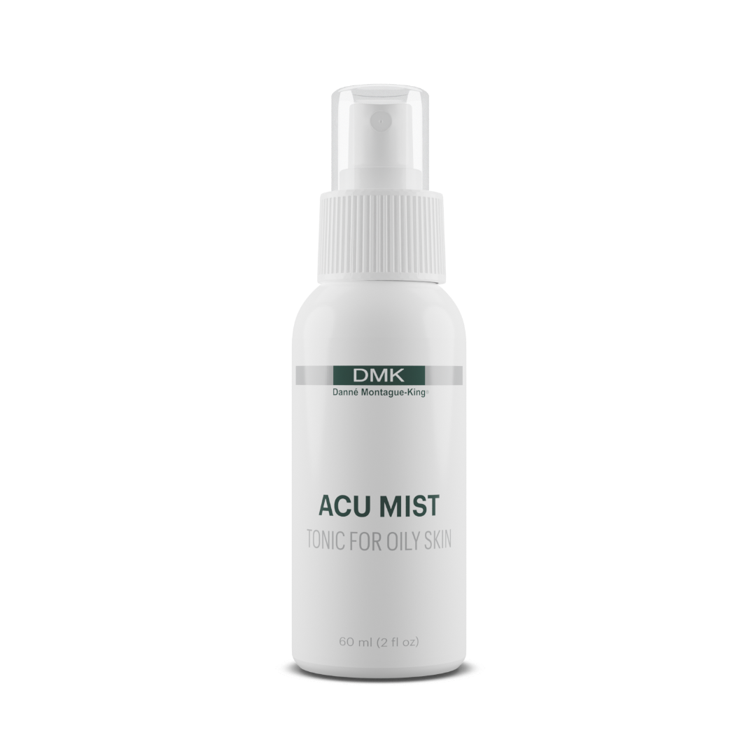 White spray bottle labeled 'ACU MIST' with 'DMK' branding on a white background