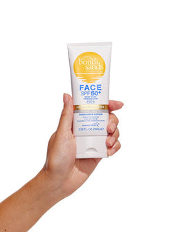 Bondi Sands SPF50+ Matte Tinted Face Lotion held in a hand