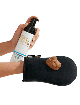 Bondi Sands Self Tan Foam Light applied to a glove