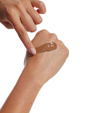 Bondi Sands Tinted Skin Perfector Gradual Tanning Lotion applied to a wrist