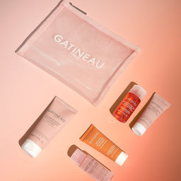 Gatineau skincare products on a peach background