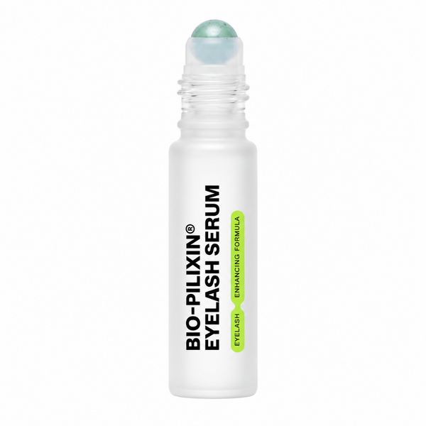 A frosted white roll-on bottle of Bio-Pilxin Eyelash Serum with a clear cap and a light green bead, shown on a solid white background.
