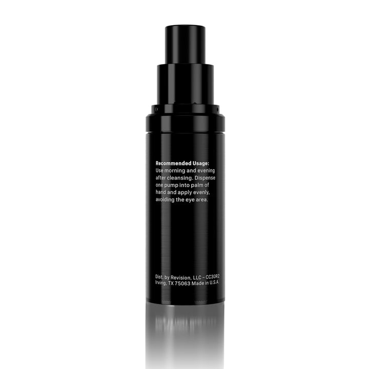 A black cylindrical cosmetic pump bottle with white text on the front, photographed against a clean white background with a soft reflection below.