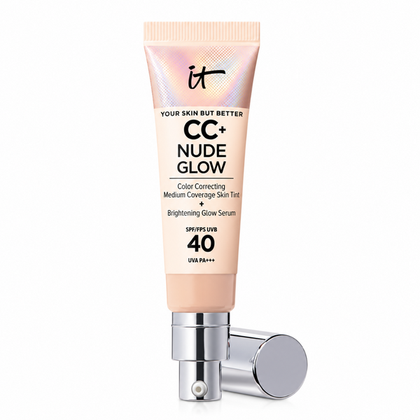 It Cosmetics CC+ Nude Glow Color Correcting Medium Coverage Skin Tint in a squeeze tube with a silver pump, shown with the cap off on a white background.