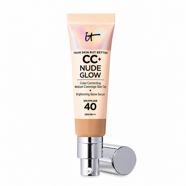 It Cosmetics CC+ Nude Glow Color Correcting Medium Coverage Skin Tint + Brightening Glow Serum in a squeeze tube with a silver pump dispenser, shown on a plain white background.
