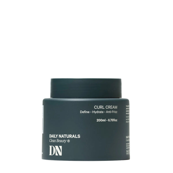 Dark blue jar of Daily Naturals Curl Cream on a white background