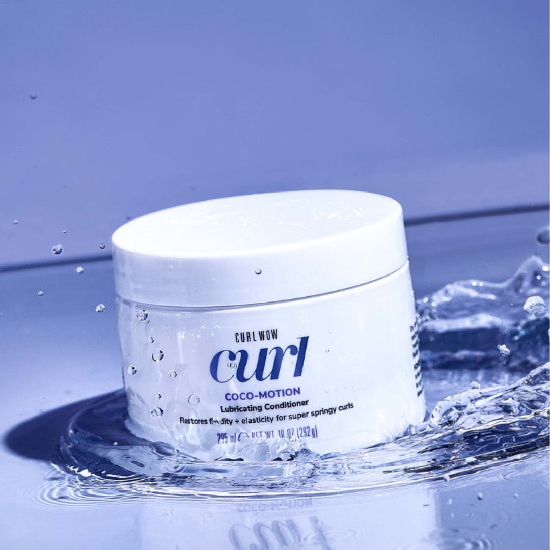 Color Wow Curl Wow Coco-Motion Lubricating Conditioner tub dropped into water
