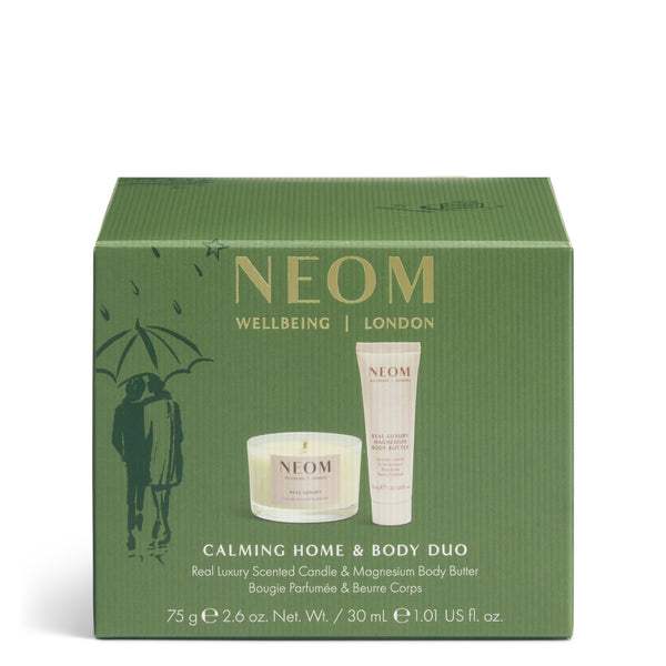 NEOM Wellbeing London Calming Home & Body Duo gift set in a textured olive green box, featuring a scented candle and a magnesium body butter tube.