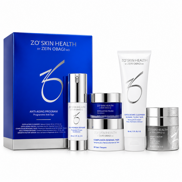 ZO Skin Health by Zein Obagi anti-aging program set, featuring a blue and silver outer box, a white cleansing tube, a silver pump bottle, a blue jar, a white jar, and a silver jar, arranged on a white background.