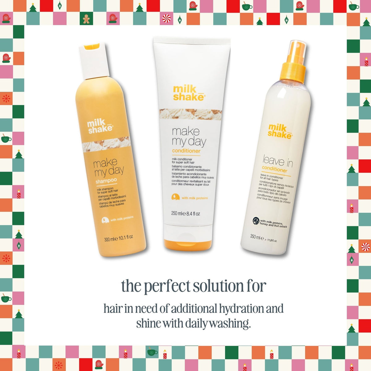Three Milk Shake hair care products are displayed against a white background with a colorful Christmas-themed border. The products are a yellow-orange hair conditioner bottle, a white conditioner tube, and a white leave-in conditioner spray bottle with a yellow cap.