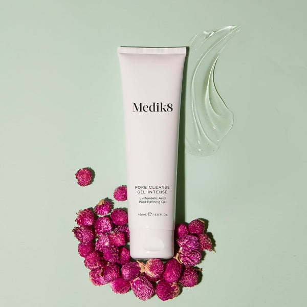 Medik8 Pore Cleanse Gel Intense surrounded by roses