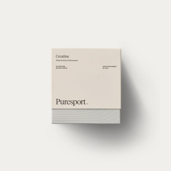 Creatine Puresport supplement box on a white background