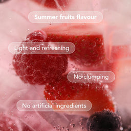 Strawberries and raspberries in a liquid with text highlighting summer fruits flavor, light refreshing nature, no clumping, and no artificial ingredients.