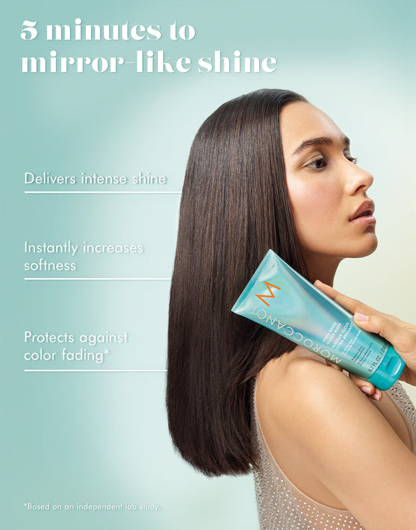 Woman holding a bottle of hair product with text about its benefits on a light blue background