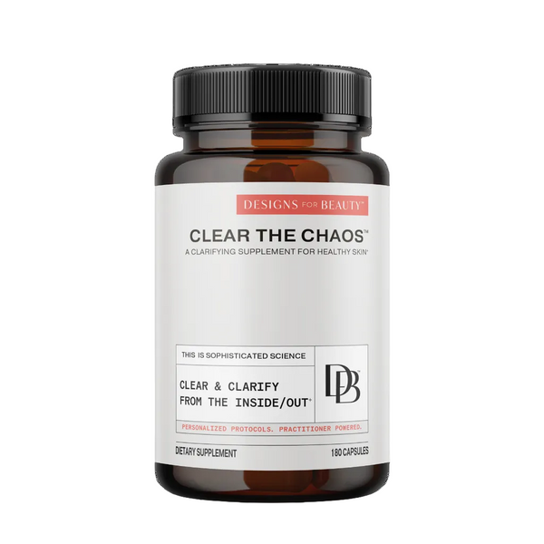 Supplement bottle labeled 'Clear The Chaos' by Designs for Beauty on a white background