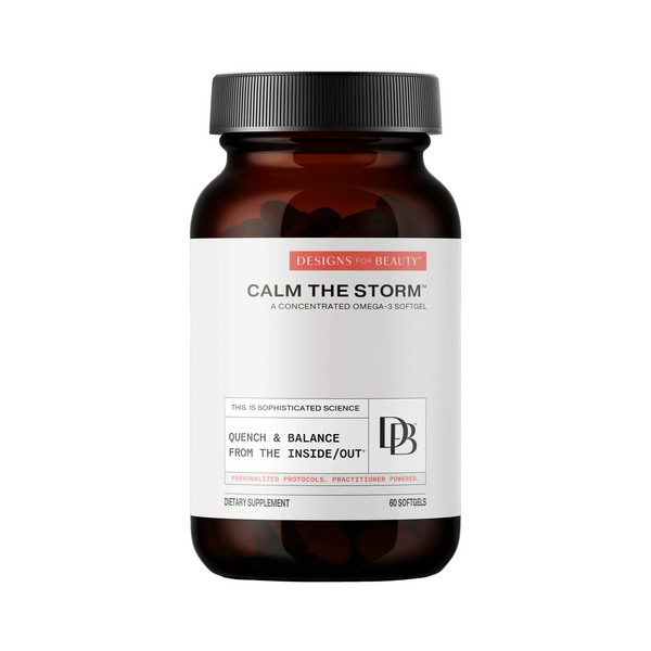 Supplement bottle labeled 'Calm The Storm' by Designs for Beauty on a white background