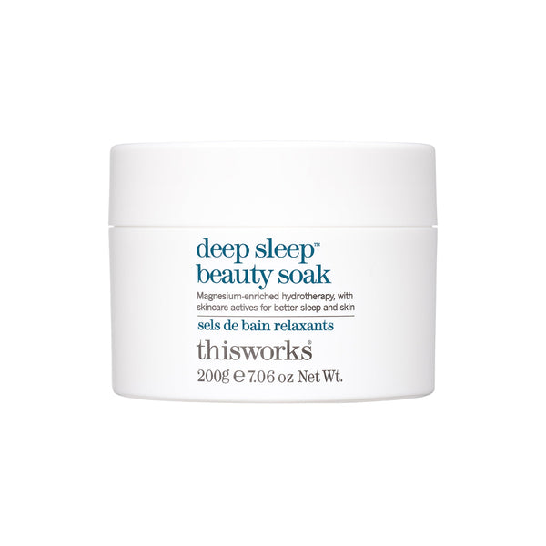 A white jar of thisworks Deep Sleep Beauty Soak on a clean white background.